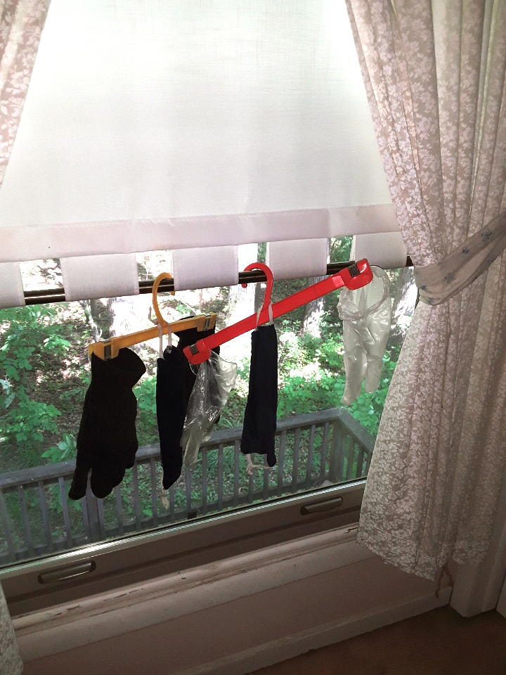 coronavirus vacation hanging gloves  and masks to dry