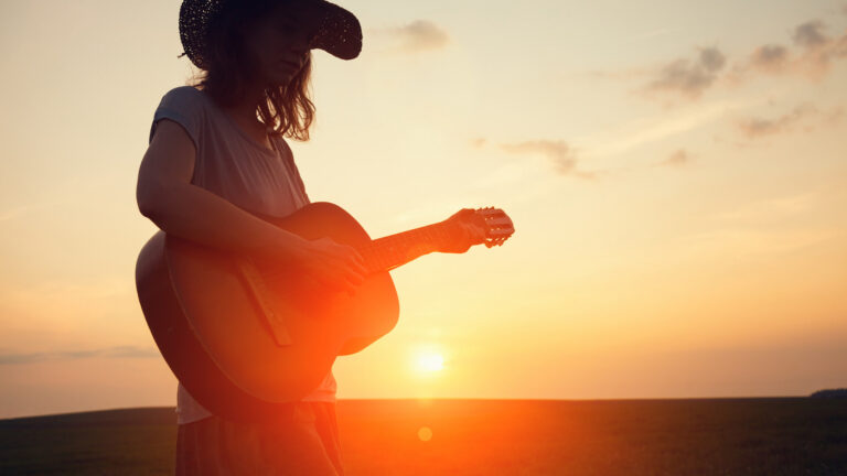 Love gone wrong as the sun sets on a relationship with a guitar player