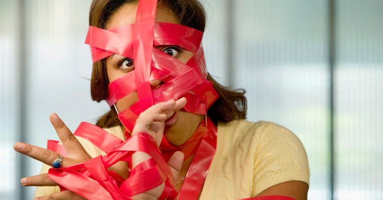 Woman caught in red tape