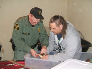 Mike the volunteer with a Department of Natural Resources Police officer.