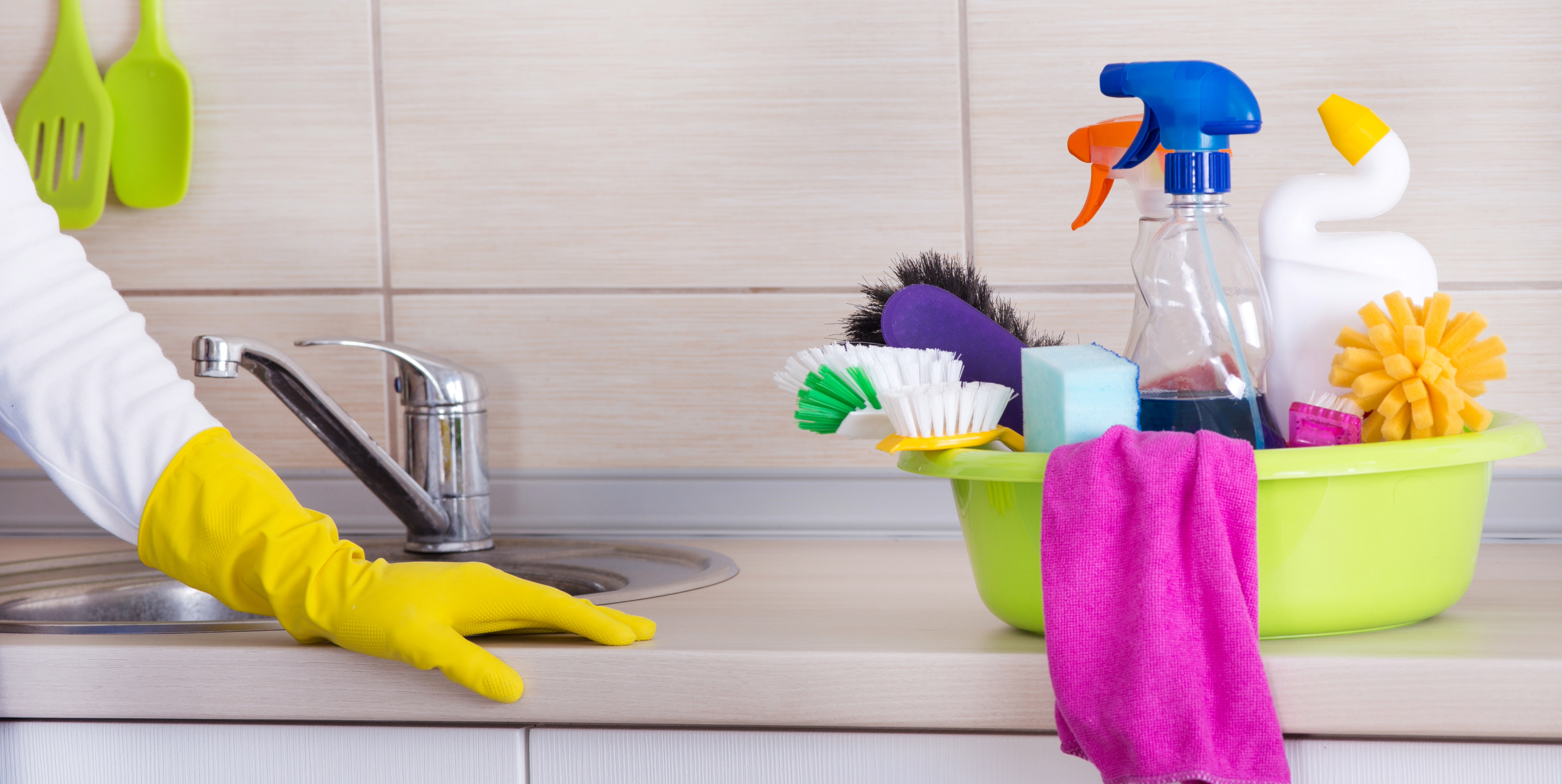 Cleaning ladies tools: rubber glove and cleaning supplies
